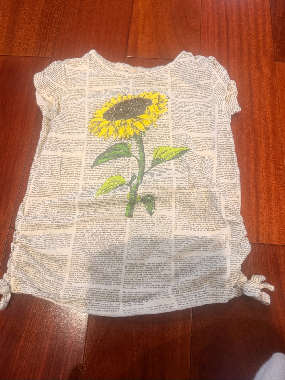 Adorable
Kids sunflower newspaper tee